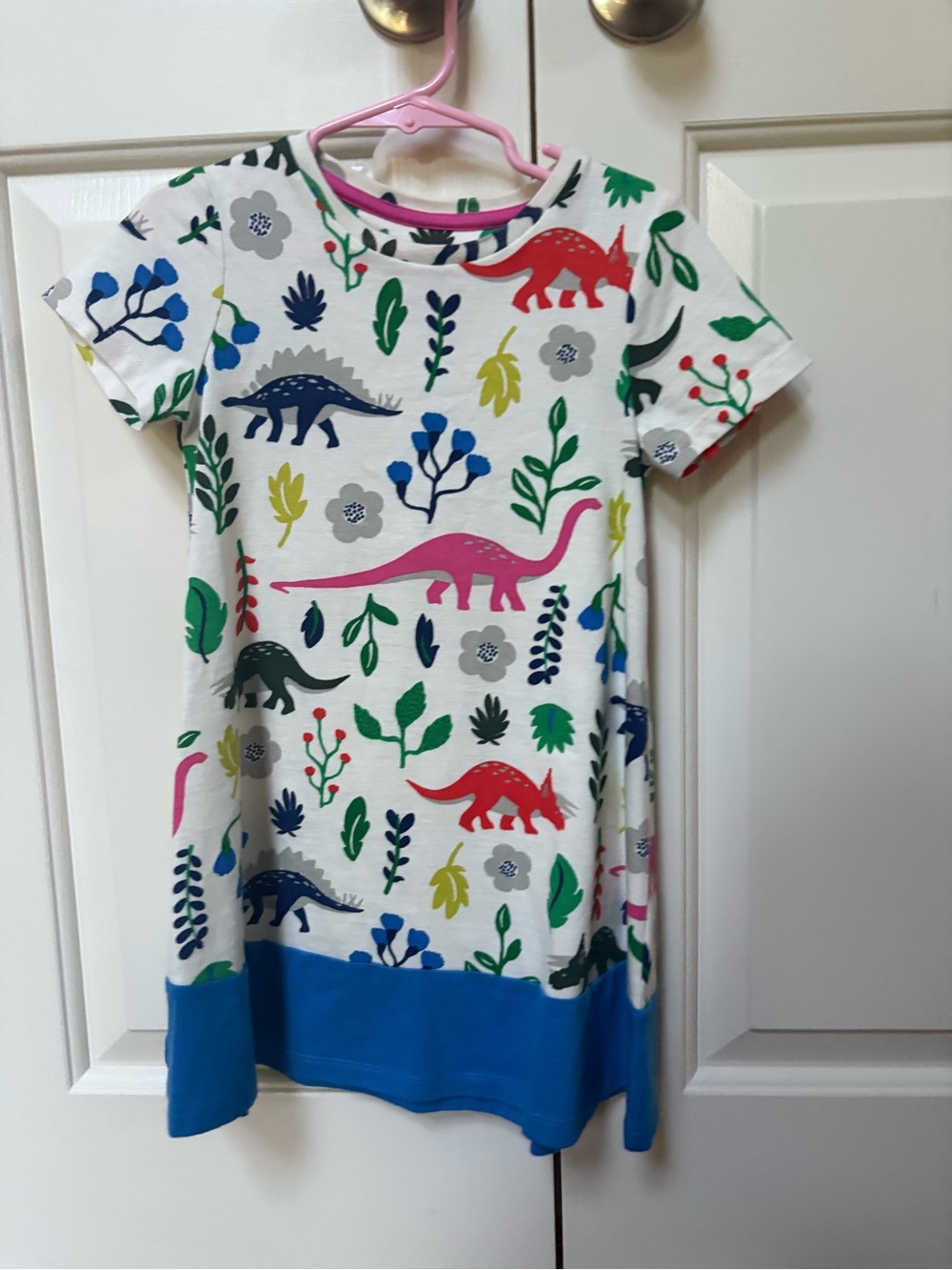 White Dinosaur Print Tee with Blue Hem